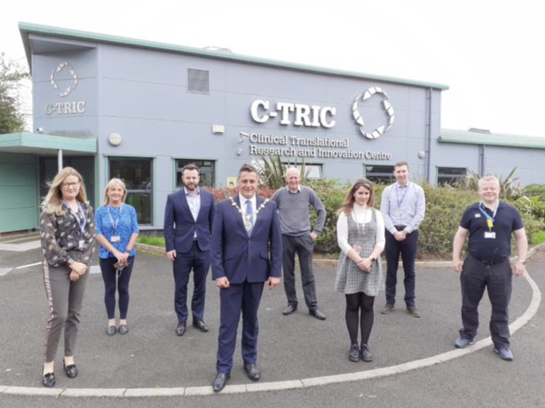 Photo of staff outside of the C-TRIC building with visiting DCSDC and SDLP guests.